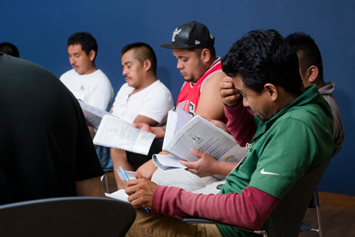 a group of men at a session
